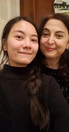 Teacher and student at the school